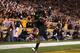 TEMPE, AZ - NOVEMBER 19: Wide receiver Gerell Robinson #8 of the Arizona State Sun Devils scores on a 11 yard touchdown reception against the Arizona Wildcats during the second quarter of the college football game at Sun Devil Stadium on November 19, 2011 in Tempe, Arizona. (Photo by Christian Petersen/Getty Images)