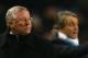 MANCHESTER, ENGLAND - JANUARY 19: Manchester United Manager Sir Alex Ferguson looks on as Manchester City Manager Roberto Mancini gestures during the Carling Cup Semi Final match between Manchester City and Manchester United at the City of Manchester Stadium on January 19, 2010 in Manchester, England. (Photo by Alex Livesey/Getty Images)
