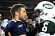 DENVER, CO - NOVEMBER 17: Tim Tebow #15 of the Denver Broncos talks with Mark Sanchez #6 of the New York Jets following the game at Sports Authority Field at Mile High on November 17, 2011 in Denver, Colorado. (Photo by Garrett W. Ellwood/Getty Images)