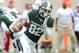 EAST LANSING, MI - NOVEMBER 19: Keshawn Martin #82 of the Michigan State Spartans runs for a touchdown on a hand off from Kirk Cousins #8 during the second quarter of the game against the Indiana Hoosiers at Spartan Stadium on November 19, 2011 in East Lansing, Michigan. (Photo by Mark A. Cunningham/Getty Images)