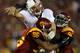 LOS ANGELES, CA - OCTOBER 29: Quarterback Andrew Luck #12 of the Stanford Cardinal is hit after throwing a pass by defensive linemen Wes Horton #96 and Dajohn Harris #98 of the USC Trojans at the Los Angeles Memorial Coliseum on October 29, 2011 in Los Angeles, California. (Photo by Stephen Dunn/Getty Images)