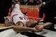 CHICAGO, IL - APRIL 28: Derrick Rose #1 of the Chicago Bulls is examined after suffering an injury against the Philadelphia 76ers in Game One of the Eastern Conference Quarterfinals during the 2012 NBA Playoffs at the United Center on April 28, 2012 in Chicago, Illinois. The Bulls defeated the 76ers 103-91. NOTE TO USER: User expressly acknowledges and agrees that, by downloading and or using this photograph, User is consenting to the terms and conditions of the Getty Images License Agreement. (Photo by Jonathan Daniel/Getty Images)