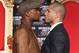 HOLLYWOOD, CA - MARCH 01: Floyd Mayweather and Miguel Cotto pose at a press conference to promote their upcoming fight on May 5 at the MGM Grand in Las Vegas at Grauman's Chinese Theatre on March 1, 2012 in Hollywood, California. (Photo by Jeff Gross/Getty Images)