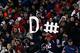 FOXBORO, MA - DECEMBER 06: Fans of the New England Patriots hold up a sign which reads defense against the New York Jets at Gillette Stadium on December 6, 2010 in Foxboro, Massachusetts. The Patriots won 45-3. (Photo by Jim Rogash/Getty Images)