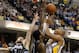 INDIANAPOLIS, IN - APRIL 30: David West #21 of the Indiana Pacers takes a jump shot over Earl Clark #3 and J.J. Redick #7 of the Orlando Magic in Game Two of the Eastern Conference Quarterfinals during the 2012 NBA Playoffs on April 30, 2012 at Bankers Life Fieldhouse in Indianapolis, Indiana. Indiana won the game 93-78 to tie the series 1-1. NOTE TO USER: User expressly acknowledges and agrees that, by downloading and or using this photograph, User is consenting to the terms and conditions of the Getty Images License Agreement. (Photo by Gregory Shamus/Getty Images)