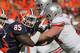 CHAMPAIGN, IL - OCTOBER 15: Whitney Mercilus #85 of the Illinois Fighting Illini rushes against Jack Mewhort #74 of the Ohio State Buckeyes at Memorial Stadium on October 15, 2011 in Champaign, Illinois. Ohio State defeated Illinois 17-7. (Photo by Jonathan Daniel/Getty Images)