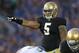 SOUTH BEND, IN - SEPTEMBER 03: Manti Te'o #5 of the Notre Dame Fighting Irish calls signals against the University of South Florida Bulls at Notre Dame Stadium on September 3, 2011 in South Bend, Indiana. South Florida defeated Notre Dame 23-20. (Photo by Jonathan Daniel/Getty Images)