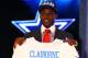 NEW YORK, NY - APRIL 26: Morris Claiborne (R)from LSU holds up a jersey as he stands on stage after he was selected #6 overall by the Dallas Cowboys in the first round of during the 2012 NFL Draft at Radio City Music Hall on April 26, 2012 in New York City. (Photo by Al Bello/Getty Images)