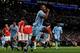 MANCHESTER, ENGLAND - APRIL 30: Vincent Kompany of Manchester City celebrates scoring the opening goal during the Barclays Premier League match between Manchester City and Manchester United at the Etihad Stadium on April 30, 2012 in Manchester, England. (Photo by Michael Regan/Getty Images)