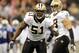 NEW ORLEANS, LA - OCTOBER 23: Jonathan Vilma #51 of the New Orleans Saints calls a defensive play during a game against the Indianapolis Colts being held at Mercedes-Benz Superdome on October 23, 2011 in New Orleans, Louisiana. The Saints defeated the Colts 62-7. (Photo by Stacy Revere/Getty Images)