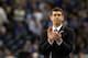 HOUSTON, TX - APRIL 04: Head coach Brad Stevens of the Butler Bulldogs claps from the sidelines against the Connecticut Huskies during the National Championship Game of the 2011 NCAA Division I Men's Basketball Tournament at Reliant Stadium on April 4, 2011 in Houston, Texas. (Photo by Streeter Lecka/Getty Images)