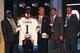 NEW YORK, NY - APRIL 26: Morris Claiborne from LSU stands on stage with family and friends including his son Morris Jr. and LSU head coach Les Miles (C) after Claiborne was selected #6 overall by the Dallas Cowboys during the 2012 NFL Draft at Radio City Music Hall on April 26, 2012 in New York City. (Photo by Al Bello/Getty Images)