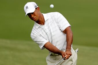 Tiger chipped it close and made par on No. 18