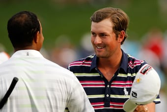 Tiger Woods shot 71 and trails the leaders by six shots at the Wells Fargo Championship