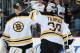 NEWARK, NJ - OCTOBER 16: Tim Thomas #30 of the Boston Bruins is congratulated by Tuukka Rask #40 of the Boston Bruins after the Boston Bruins defeated the New Jersey Devils 4-1 at the Prudential Center on October 16, 2010 in Newark, New Jersey. (Photo by Christopher Pasatieri/Getty Images)