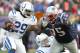 FOXBORO, MA - DECEMBER 4: Joseph Addai #29 of the Indianapolis Colts is stopped by Vince Wilfork #75 of the New England Patriots in the second half at Gillette Stadium on December 4, 2011 in Foxboro, Massachusetts. (Photo by Jim Rogash/Getty Images)