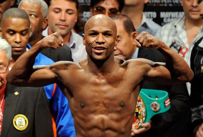 Mayweather takes first round.