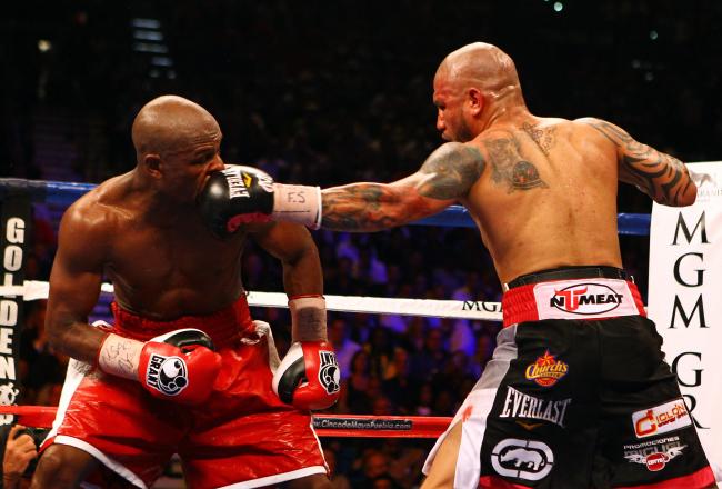Cotto connects against Mayweather.