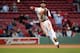 BOSTON, MA - MAY 6: Dustin Pedrioa #11 of the Boston Red Sox throws to first base for the double play in the sixteenth inning against the Baltiomore Orioles at Fenway Park May 6, 2012 in Boston, Massachusetts. (Photo by Darren McCollester/Getty Images)