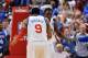 Andre Iguodala celebrates a basket in Philadelphia's 89-82 Game 4 win over Chicago.
