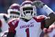 OXFORD, MS - OCTOBER 22: Marquel Wade #1 of the Arkansas Razorbacks salutes the crowd after a big run against the Ole Miss Rebels at Vaught-Hemingway Stadium on October 22, 2011 in Oxford, Mississippi. The Razorbacks defeated the Rebels 29 to 24. (Photo by Wesley Hitt/Getty Images)