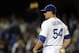 LOS ANGELES, CA - APRIL 12: Javy Guerra #54 of the Los Angeles Dodgers pitches a save in a 3-2 win over the Pittsburgh Pirates at Dodger Stadium on April 12, 2012 in Los Angeles, California. (Photo by Harry How/Getty Images)