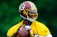 ASHBURN, VA - MAY 06: Robert Griffin III #10 of the Washington Redskins drops back to make a pass during the Washington Redskins rookie minicamp on May 6, 2012 in Ashburn, Virginia. (Photo by Patrick McDermott/Getty Images)