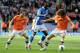 Victor Moses dribbling around Newcastle United's Fabricio Coloccini