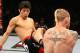 Hatsu Hioki (L) delivers a kick (Al Bello/Zuffa, LLC)