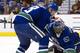 Tanev and Luongo tries to freeze the puck for a whistle.