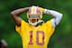 ASHBURN, VA - MAY 06: Robert Griffin III #10 of the Washington Redskins practices during the Washington Redskins rookie minicamp on May 6, 2012 in Ashburn, Virginia. (Photo by Patrick McDermott/Getty Images)