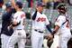 CLEVELAND, OH - MAY 7: Jack Hannahan #9 manager manager Manny Acta #11 and Carlos Santana #41 of the Cleveland Indians celebrate after defeating the Chicago White Sox at Progressive Field on May 7, 2012 during the first game of a doubleheader in Cleveland, Ohio. The Indians defeated the White Sox 8-6. (Photo by Jason Miller/Getty Images)