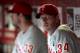 PHOENIX, AZ - APRIL 26: Pitcher Roy Halladay #34 (R) and Cliff Lee #33 of the Philadelphia Phillies sit in the dugout during the Major League Baseball game against the Arizona Diamondbacks at Chase Field on April 26, 2011 in Phoenix, Arizona. (Photo by Christian Petersen/Getty Images)