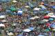 LOUISVILLE, KY - MAY 07: Fans gather and party in the infield during the 137th Kentucky Derby at Churchill Downs on May 7, 2011 in Louisville, Kentucky. (Photo by Jamie Squire/Getty Images)