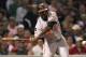 BOSTON, MA - SEPTEMBER 20: Vladimir Guerrero #27 of the Baltimore Orioles slaps the ball to right field where Josh Reddick #16 of the Boston Red Sox (not pictured) mishandled a fly ball in the third inning at Fenway Park September 20, 2011 in Boston, Massachusetts. (Photo by Jim Rogash/Getty Images)