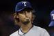 TORONTO, CANADA - APRIL 30: Yu Darvish #11 of the Texas Rangers walks to the dugout after the sixth inning against the Toronto Blue Jays during MLB action at the Rogers Centre April 30, 2012 in Toronto, Ontario, Canada. (Photo by Abelimages/Getty Images)