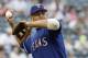 ARLINGTON, TX - AUGUST 17: Alex Rodriguez #3 of the Texas Rangers throws the ball against the Chicago White Sox at the Ballpark in Arlington on August 17, 2003 in Arlington, Texas. The White Sox defeated the Rangers 6-4. (Photo by Ronald Martinez/Getty Images)