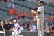 Colby Lewis could only watch as five batters rounded the bases on home runs.