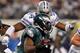ARLINGTON, TX - DECEMBER 24: LeSean McCoy #25 of the Philadelphia Eagles carries the ball against DeMarcus Ware #94 of the Dallas Cowboys at Cowboys Stadium on December 24, 2011 in Arlington, Texas. (Photo by Tom Pennington/Getty Images)