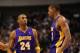 DALLAS - JANUARY 13: Derek Fisher #1, Kobe Bryant #24 and Andrew Bynum #17 of the Los Angeles Lakers on January 13, 2010 at American Airlines Center in Dallas, Texas. NOTE TO USER: User expressly acknowledges and agrees that, by downloading and/or using this Photograph, user is consenting to the terms and conditions of the Getty Images License Agreement. (Photo by Ronald Martinez/Getty Images)