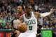 BOSTON, MA - MAY 12: Rajon Rondo #9 of the Boston Celtics avoids Evan Turner #12 of the Philadelphia 76ers in the final seconds of the of Game One of the Western Conference Semifinals in the 2012 NBA Playoffs on May 12, 2012 at TD Garden in Boston, Massachusetts. The Boston Celtics defeated the Philadelphia 76ers 92-91. NOTE TO USER: User expressly acknowledges and agrees that, by downloading and or using this photograph, User is consenting to the terms and conditions of the Getty Images License Agreement. (Photo by Elsa/Getty Images)