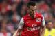 LONDON, ENGLAND - MAY 05: Laurent Koscielny of Arsenal is tackled by Simeon Jackson of Norwich City during the Barclays Premier League match between Arsenal and Norwich City at the Emirates Stadium on May 5, 2012 in London, England. (Photo by Bryn Lennon/Getty Images)