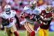 LANDOVER, MD - NOVEMBER 6: Wide receiver Braylon Edwards #17 of the San Francisco 49ers eludes cornerback DeAngelo Hall #23 of the Washington Redskins during the third quarter at FedExField on November 6, 2011 in Landover, Maryland. The San Francisco 49ers won, 19-11. (Photo by Patrick Smith/Getty Images)