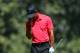 AUGUSTA, GA - APRIL 08: Tiger Woods of the United States reacts after an approach shot on the fifth hole during the final round of the 2012 Masters Tournament at Augusta National Golf Club on April 8, 2012 in Augusta, Georgia. (Photo by Andrew Redington/Getty Images)