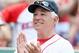 BOSTON, MA - MAY 13: Manager Bobby Valentine of the Boston Red Sox salutes a fan during the game against the Cleveland Indians on April 21, 2012 at Fenway Park in Boston, Massachusetts. (Photo by Elsa/Getty Images)