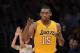 LOS ANGELES, CA - MAY 12: Metta World Peace #15 of the Los Angeles Lakers reacts after making a shot against the Denver Nuggets in Game Seven of the Western Conference Quarterfinals in the 2012 NBA Playoffs on May 12, 2012 at Staples Center in Los Angeles, California. NOTE TO USER: User expressly acknowledges and agrees that, by downloading and or using this photograph, User is consenting to the terms and conditions of the Getty Images License Agreement. (Photo by Harry How/Getty Images)