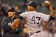 BALTIMORE, MD - MAY 14: Manager Joe Girardi looks on as starting pitcher Ivan Nova #47 of the New York Yankees throws after being hit in the foot against the Baltimore Orioles during the third inning at Oriole Park at Camden Yards on May 14, 2012 in Baltimore, Maryland. (Photo by Rob Carr/Getty Images)