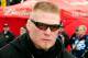 DAYTONA BEACH, FL - FEBRUARY 13: MMA fighter Brock Lesnar walks in the garage area during practice for the Daytona 500 at Daytona International Speedway on February 13, 2010 in Daytona Beach, Florida. (Photo by Sam Greenwood/Getty Images for NASCAR)