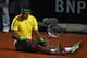 ROME, ITALY - MAY 15: Rafael Nadal of Spain shows his dejection after falling during the final against Novak Djokovic of Serbia during day eight of the Internazoinali BNL D'Italia at the Foro Italico Tennis Centre on May 15, 2011 in Rome, Italy. (Photo by Clive Brunskill/Getty Images)
