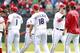ARLINGTON, TX - APRIL 12: Yu Darvish #11 of the Texas Rangers congratulates Josh Hamilton #32 and team for the win against the Seattle Mariners at Rangers Ballpark in Arlington on April 12, 2012 in Arlington, Texas. (Photo by Rick Yeatts/Getty Images)